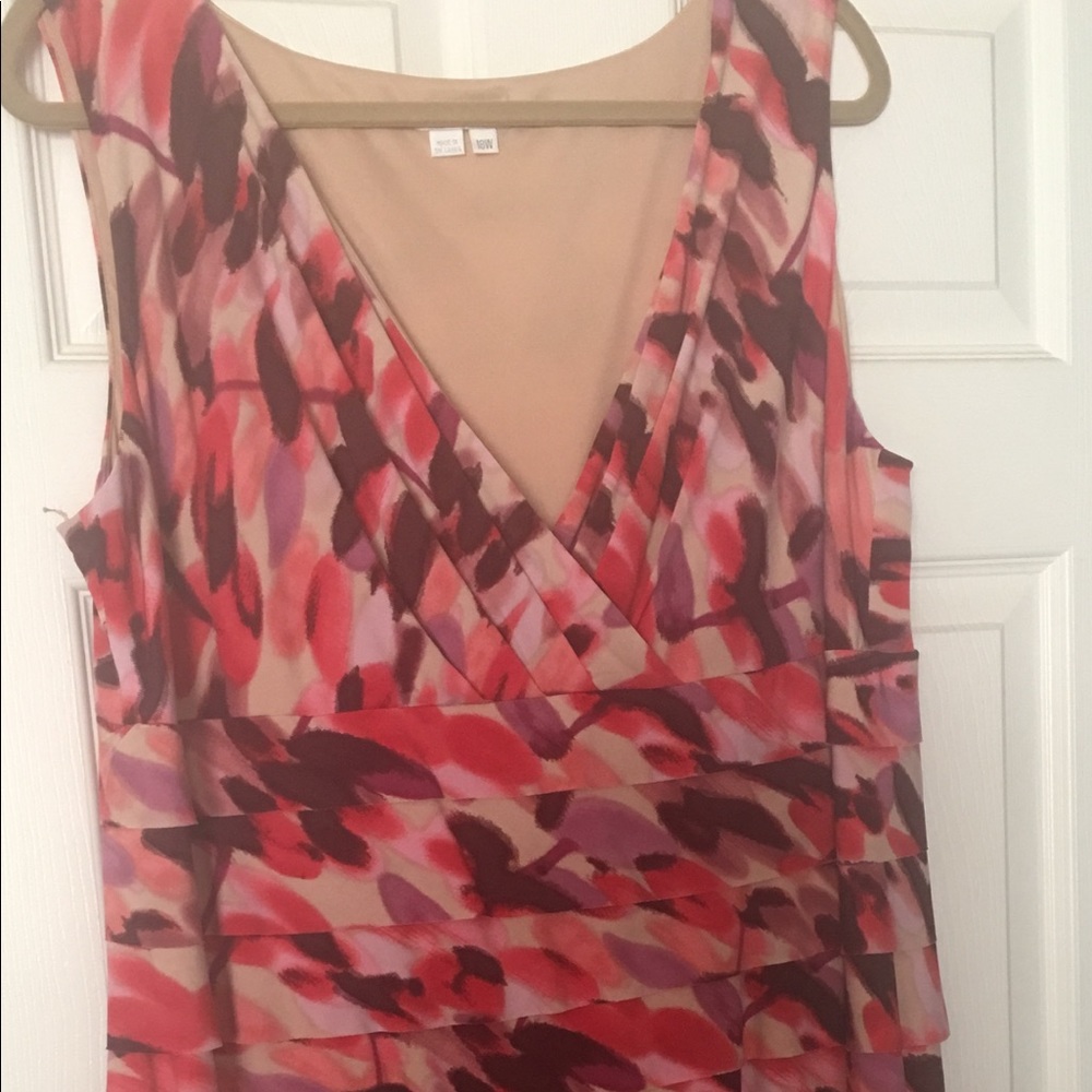 Surplice, sleeveless, layered dress.